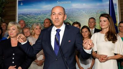Janez Jansa, president of the SDS (Slovenian Democratic Party), talks to the media after his party were the largest party in national elections, according to the initial polls result. EPA/ANTONIO BAT