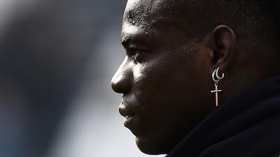 Brescia's Mario Balotelli warms up before the match against Juventus. Reuters