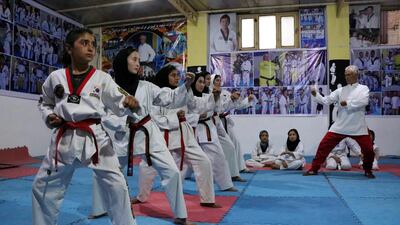 Afghan girls practice Taekwondo during a martial-arts class in Herat, Afghanistan, on Tuesday, February 16. EPA