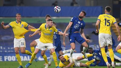 Olivier Giroud of Chelsea and Adam Webster of Brighton & Hove Albion battle for the ball during the Premier League match between Chelsea and Brighton & Hove Albion at Stamford Bridge on April 20, 2021 in London, England. Getty Images