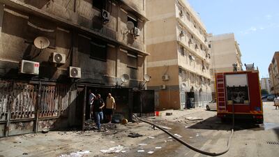 Firefighters put out a fire inside a shop. Reuters