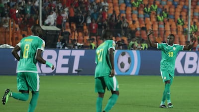 Senegal's Sadio Mane, right, gestures in frustration. AP