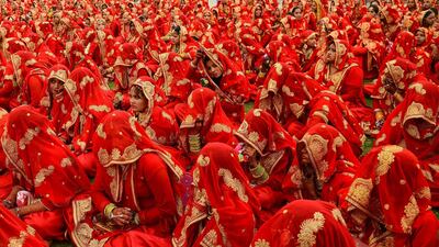 Indian Muslim brides-to-be gather as they participate in a mass wedding ceremony in Ahmedabad. AFP