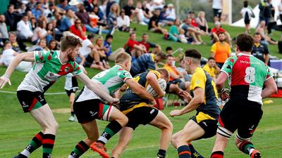Abu Dhabi Harlequins, in green, red and white, will face Jebel Ali Dragons in the UAE Premiership final. Satish Kumar for The National
