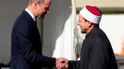 Prince William greets Imam Gamal Fouda of Al Noor mosque. AFP