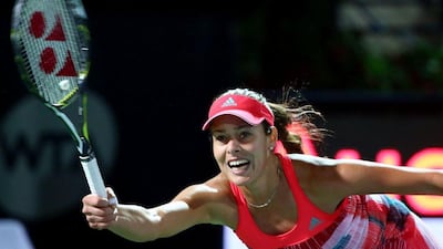 Serbia's Ana Ivanovic returns the ball to Simona Halep of Roumania during their WTA game on the third day of the Dubai Duty Free Tennis Championships, on February 17, 2016. / AFP / MARWAN NAAMANI