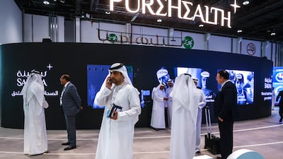 Delegates and visitors gather for the event in the UAE capital.