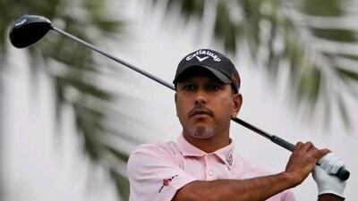 India's Jeev Milkha Singh plays a ball on the 16th hole during the 1st round of Dubai Desert Classic golf tournament in Dubai, United Arab Emirates, Thursday, Feb. 4, 2010. (AP Photo/Kamran Jebreili) *** Local Caption *** XKJ120_Emirates_Dubai_Desert_Classic_Golf.jpg