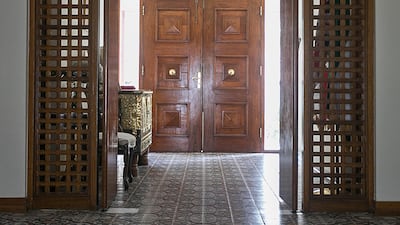 Inside the residence, diplomatic gifts and traditional objects from the region including swords, daggers and a dowry chest sit alongside modern and contemporary examples of British art. Mona Al Marzooqi / The National