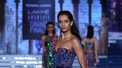 The line was inspired by the designer's passion for art, music and architecture. EPA