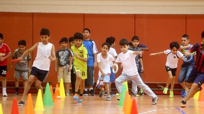 Children can benefit from getting involved in sports. Christopher Pike / The National