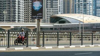 Demithan's works take over large billboards. Chris Whiteoak / The National