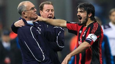 AC Milan’s Gennaro Gattuso strikes out at Joe Jordan, Tottenham Hotspur’s first-team coach, on Tuesday night.