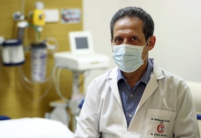 Dr Mohamad Karima says he has seen patients whose symptoms took a long time to subside. Chris Whiteoak / The National