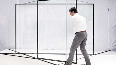 Dirk Van Gaubergen, who heads the Louvre Abu Dhabi team for Meyvaert in Ghent, Belgium, with some of the ‘masterpieces’. Yann Bertrand for The National