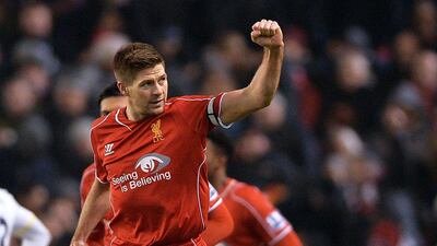 Liverpool's Steven Gerrard celebrates after scoring to make it 2-1 against Tottenham Hotspur in an eventual 3-2 win on Tuesday at Anfield. Peter Powell / EPA