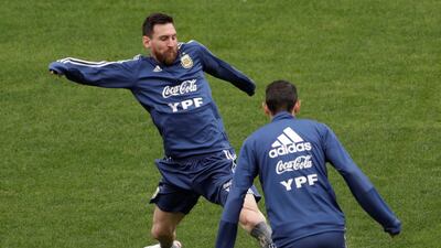 Argentina's Lionel Messi and Angel Di Maria during training. Reuters