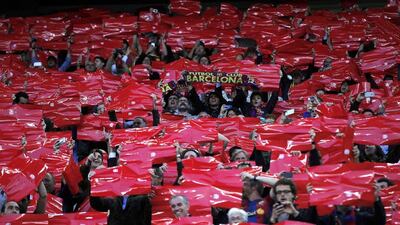 Barcelona supporters cheer on their team during the first leg of the Champions League semi-final tie against Bayern Munich on Wednesday. Alberto Estevez / EPA