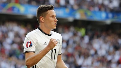 Germany's Julian Draxler celebrates after scoring their third goal agains Slovakia on Sunday in their Euro 2016 last 16 victory. Pascal Rossignol / Reuters / June 26, 2016
