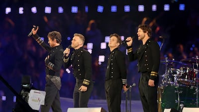 Jason Orange, Gary Barlow, Mark Owen and Howard Donald of Take That perform during the Closing Ceremony on Day 16 of the London 2012 Olympic Games at Olympic Stadium. Scott Heavey / Getty Images