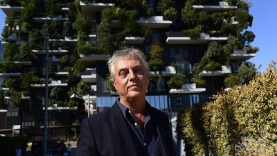 Italian architect and urban planner Stefano Boeri poses on September 5, 2017 at the architectural complex designed by Studio Boeri, the "Bosco Verticale" in the Porta Nuova area in Milan. Miguel Medina / AFP