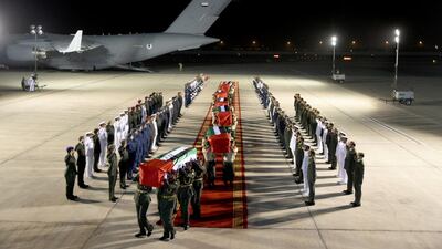 The bodies of the martyrs arrive in the UAE yesterday. WAM