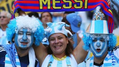 Argentina fans shown with a Messi scarf prior to Argentina's match against Iran on Saturday at the 2014 World Cup in Belo Horizonte, Brazil. Ronald Martinez / Getty Images / June 21, 2014