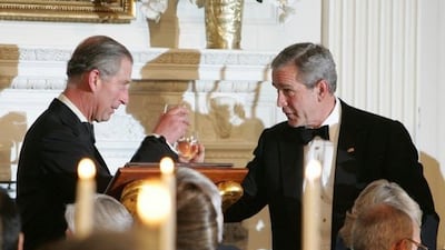 President George W Bush and King Charles, who was Prince of Wales at the time, toast one another during a dinner at the White House in 2005. Photo: White House