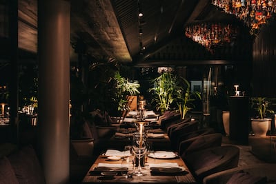 The signature toy figurine chandeliers. Photo: Clap London