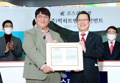 Bang Si-hyuk (L) founder of Big Hit Entertainment at the company's IPO ceremony. Getty Images