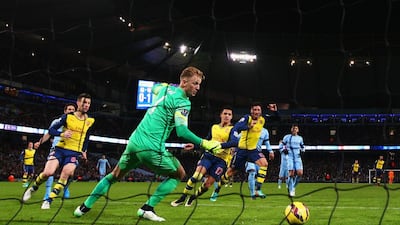 Olivier Giroud scores Arsenal’s second goal with a header past Joe Hart. Michael Steele/Getty Images