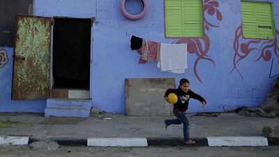 A group of two dozen artists has painted the walls, doorsteps and facades of all the houses along the 1.5 kilometre-long edge of the camp.