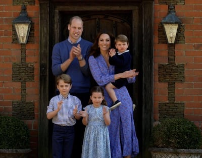 The Duke and Duchess of Cambridge clap for carers with their three children, Prince George, Princess Charlotte and Prince Louis, in April 2020. Instagram / Kensington Royal