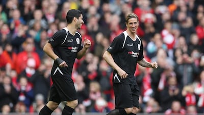 Luis Suarez and Fernando Torres come on for the second half. Alex Morton / Reuters