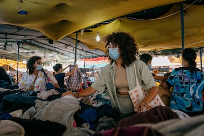 Wided Asly says the fripe has helped her curb her fast-fashion addiction. "I can be into fashion and style, but in a really healthy way, a sustainable way." Erin Clare Brown / The National