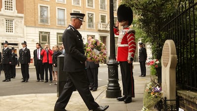 Metropolitan Police Commissioner Sir Paul Stephenson lays a wreath at the 25th anniversary ceremony in St James's Square in 2009