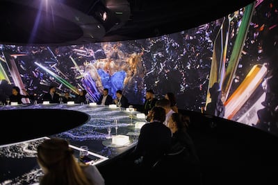 The circular dining room has an interactive tablecloth and a projecting screen that doubles as a canvas. Photo: Krasota