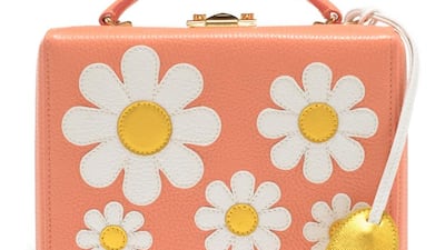 Grace bag with daisy appliqué. Courtesy Mark Cross
