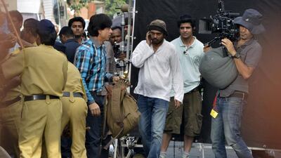 Shah Rukh Khan outside his home in Mumbai during filming of his upcoming movie, Fan. Getty Images
