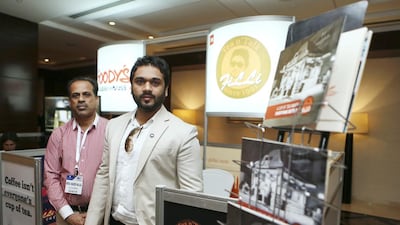 From left: Abdul Naseer Maliga and Rafih Filli, the founder of Filli Cafe, during the World Franchise Forum in Dubai. Sarah Dea / The National