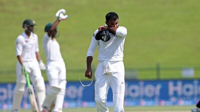 England's Adil Rashid toiled hard but looked out-of-sorts on his debut at Zayed Cricket Stadium in Abu Dhabi. Jason O'Brien / Action Images. October 14, 2015.