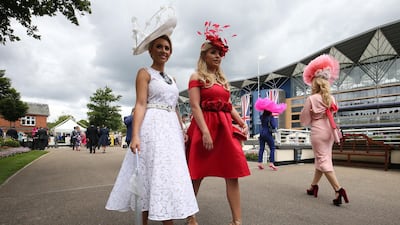 Racegoers during ladies day. PA