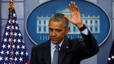US president Barack Obama waves as he departs the briefing room at the end of his final press conference at the White House on January 18, 2017. Kevin Lamarque / Reuters