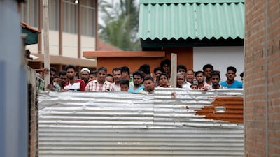 People look at the site of the gunbattle. Reuters