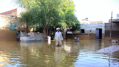 A picture taken October 29, 2016 shows a local man inspecting the damage following heavy floods in Ras Gharib, near the mouth of the Gulf of Suez in the Red Sea governorate, after flooding in parts of Egypt caused by torrential rains. AFP