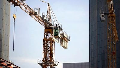 Abu Dhabi's plans to invest heavily on its infrastructure boosted share prices of property companies yesterday. Sammy Dallal / The National