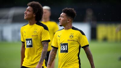 Jadon Sancho, right, and Axel Witsel. Getty