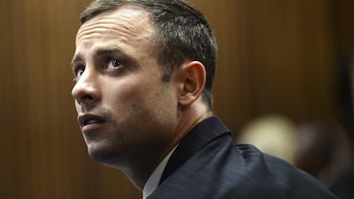 "Blade Runner" Oscar Pistorius sits in the dock in the North Gauteng High Court in Pretoria. Pistorius, 29, is expected to wear an electronic tracking tag when he is released on Friday after serving 10 months of a five-year sentence for killing his model and law graduate girlfriend Reeva Steenkamp on Valentine's Day 2013. Antoine de Ras / Reuters