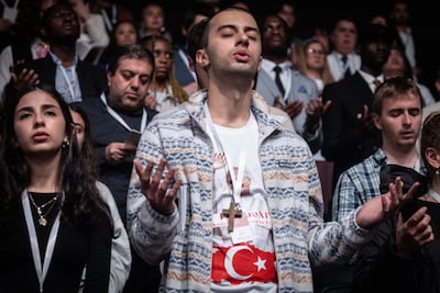 A man prays during a Mass conducted by Pope Leo XIV at the Volkswagen Arena in Istanbul on Saturday. Getty Images