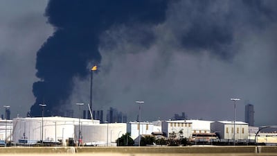 Smoke rises from a unit at oil refinery in Al Shuaiba, about 50km south of Kuwait City. Raed Qutena / EPA